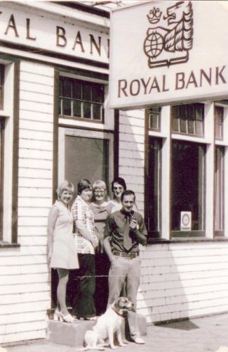 Manager Goodwin and Staff in front of bank, 1974