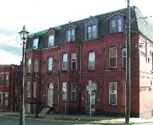 This image shows a contextual view of the building. The three bays to the right were occupied by Capt. Prichard, while the two bays to the left were the home of his son Gilbert, 2005; City of Saint John