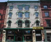 This photograph shows the contextual view of the building on Prince William Street, 2005; City of Saint John