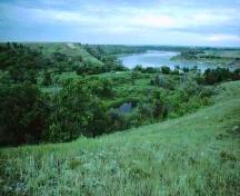 View of Opimihaw Valley at its confluence with the South Saskatchewan River, 1991.; Government of Saskatchewan, Frank Korvemaker, 1991.
