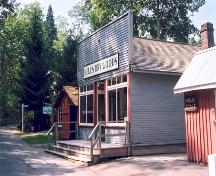Oblique view of Bell's Dry Goods from the northwest, 2003; City of Burnaby, 2003.
