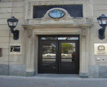 Featured is the Wellington Street entrance with projecting cornice.; Kendra Green, 2007.