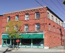 This photograph shows the contextual view of this corner building, 2007; City of Saint John