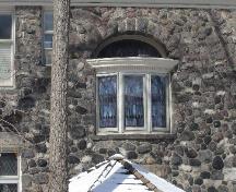 Featured is the leaded bay window with stained glass inset above.; Paul Dubniak, 2008.