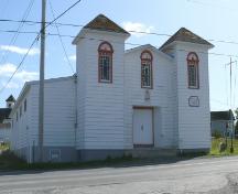 View of the left and front facades of Waterloo Loyal Orange Lodge No. 18, New Perlican, NL. Photo taken 2009. ; HFNL/Andrea O'Brien 2009