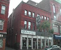 This contextual photograph shows the building with an alleyway to the north and the Masonic Temple to the south, 2004.; City of Saint John