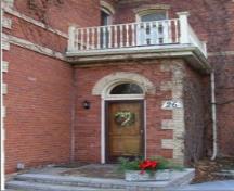 Featured is one of the entrances topped by a second storey balcony.; City of Brantford, n.d.