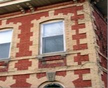 Of note are the paired cornice brackets and quoins.; City of Brantford, n.d.