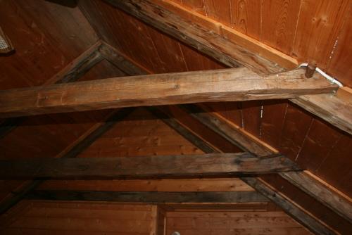 Showing wooden pegs in rafters