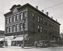 The building was designed for retail and office space. The exterior, as depicted in this 1921 photograph by the building’s owner, L. H. Higgins, is largely unchanged.; Moncton Museum