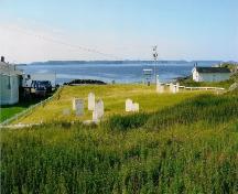 View of Old House Cove General Cemetery, Twillingate, NL showing New World Island in the background. Photo taken 2009. ; Town of Twillingate 2010