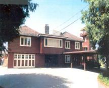 Exterior photo of the Alasken-Reifel Shooting Lodge.; (Public Works Canada, 1992.)