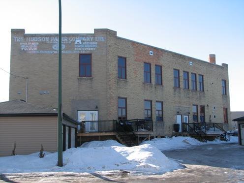 View to the west showing The Hudson Paper Co. sign