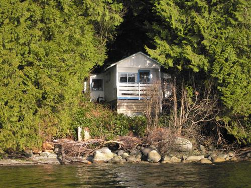 Exterior front view of Wee Cottage from the water, 2013