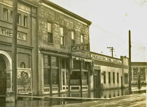 Exterior view of buildings on Front Street, 1928