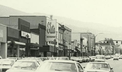 Historic exterior oblique view of the street and neon sign, c.1980