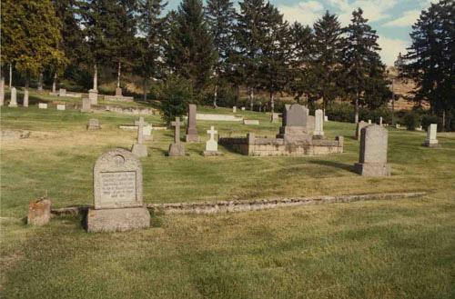 Exterior view of headstones and landscape, c.1982