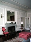 Interior view of the Wright-Scott House, showing the mouldings and the fireplace mantle in a ground-floor living room, 2006.; Parks Canada Agency / Agence Parcs Canada, Monique Trépanier, 2006.