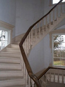 Interior view of the Manoir Papineau, showing the spiral staircase in the southwest tower, 2000.; Parks Canada | Parcs Canada, Yvan Fortier, 2000.