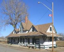 Front and side facades of the station showing the roofline and "Radville" name set in the roof, 2005.; Government of Saskatchewan, Marvin Thomas, 2005.